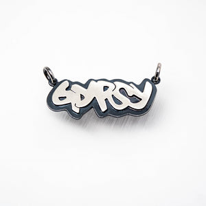 Example of customized Abstract Tag Pendant with the word/name "GYPSY". By TIN HAUS® Jewelry.