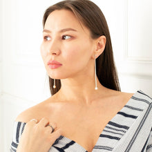 Load image into Gallery viewer, Cosmic Twin Vegan Pearl Earrings on model - TIN HAUS