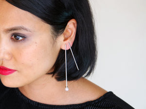 Cosmic Drop Pearl Earrings on a double-pierced ear - Sterling Silver, White Freshwater Pearl - TIN HAUS Jewelry